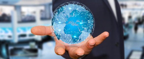 Businessman connecting different places of the world