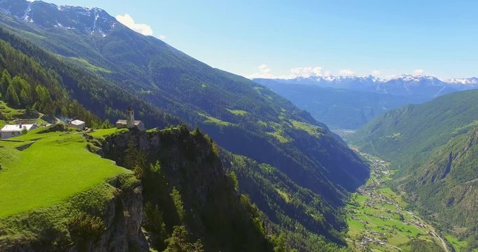 Aerial 4k - Chiesetta di San Romerio (1106) - Valle di Poschiavo - Canton Grigioni - Svizzera 