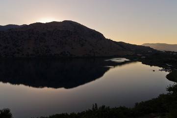 Twilight at beautiful Kournas lake near the northeast coast of Crete island, Greece