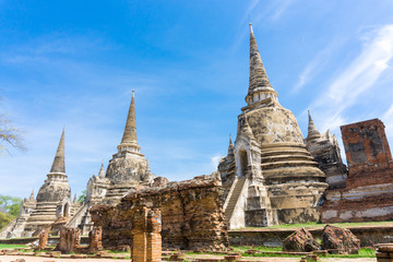 Fototapeta premium Ayutthaya Historical Park with Tree branch blue sky, Phra Nakhon