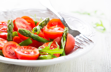 Fresh salad with cherry tomatoes and asparagus