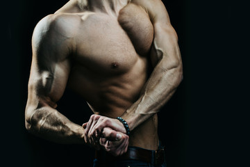 Fototapeta na wymiar Muscular man with veins on hands