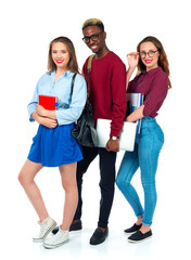 Fototapeta premium Happy students standing and smiling with books, laptop and bags