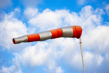 windsock on blue sky background