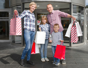 Happy family made shopping 