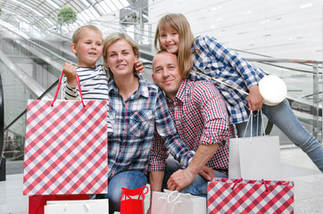 Happy family made shopping 