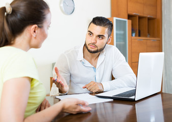 Obraz premium couple with documents in apartment