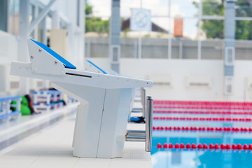 Starting blocks and lanes in a swimming pool