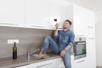 Young man with wine.