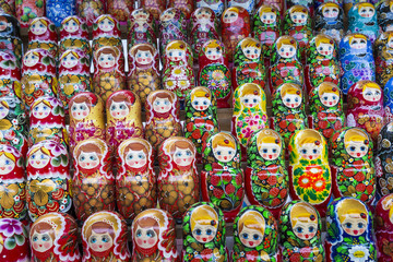Fototapeta premium Very large selection of matryoshkas Russian souvenirs at the gift shop in Moscow