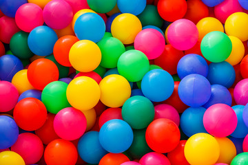 Fototapeta na wymiar box filled with small colored balls