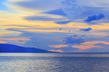 clouds over the painted water dawn