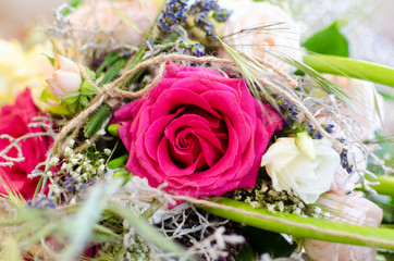 Pink rose on wedding day