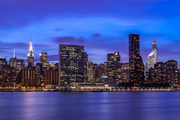 Fototapeta na wymiar New York City Manhattan buildings skyline at night