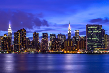 Fototapeta na wymiar New York City Manhattan buildings skyline at night
