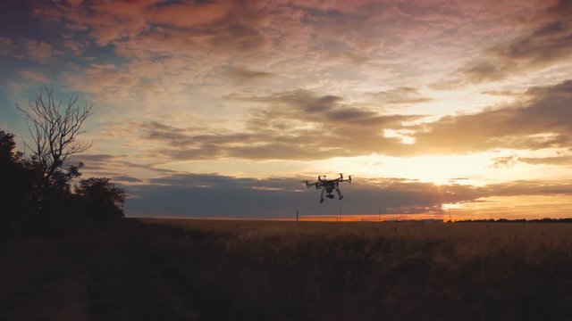 Custom drone hexacopter flies in the sky