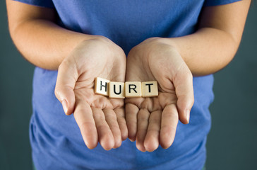 Hurt Spelled in Tiles