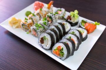 Sushi set with chopsticks on the plate