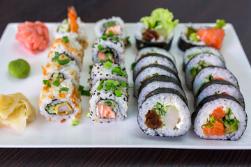 Sushi set with chopsticks on the plate