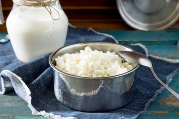 Homemade cheese and a jug of milk, healthy food, cooking healthy