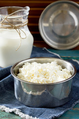 Homemade cheese and a jug of milk, healthy food, cooking healthy