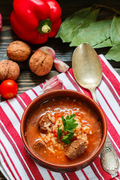 Kharcho soup. Thick beef soup with rice, tomatoes, carrots, peppers, walnuts and spices. A traditional dish of Georgian cuisine