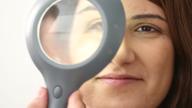 woman smiles during eyes test