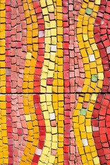 Colorful yellow, orange and red tile mosaic pattern