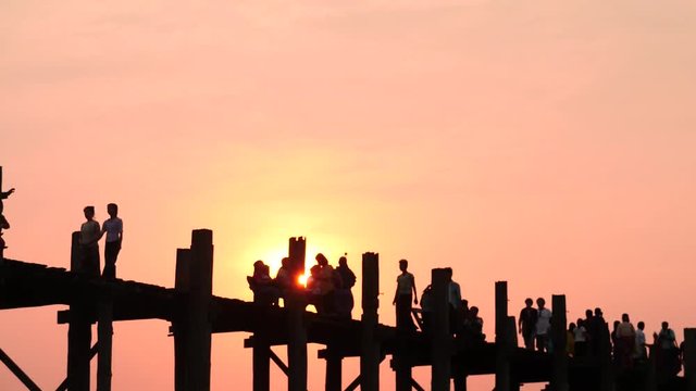  bein bridge in Myanmar people motion sunset time lapse