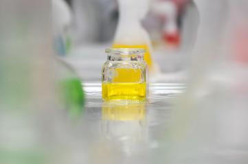 Chemical experiments in the laboratory. Fluid in the flasks.