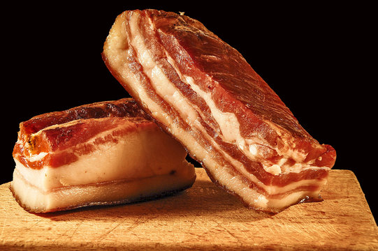 Two pieces of bacon _ red