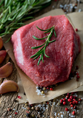 raw beef on wooden surface