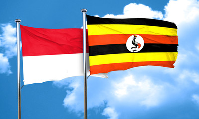 monaco flag with Uganda flag, 3D rendering
