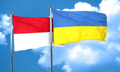 monaco flag with Ukraine flag, 3D rendering