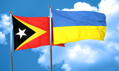 east timor flag with Ukraine flag, 3D rendering