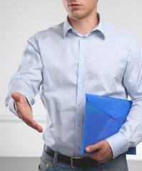 Businessman offering his hand for handshake