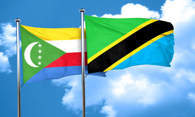 Comoros flag with Tanzania flag, 3D rendering