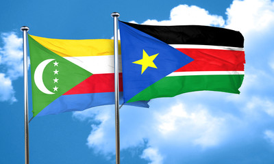 Comoros flag with South Sudan flag, 3D rendering