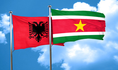 Albania flag with Suriname flag, 3D rendering