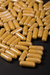 colorful drugs and supplement pills. Background or texture