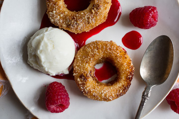 Peach doughnuts on plate