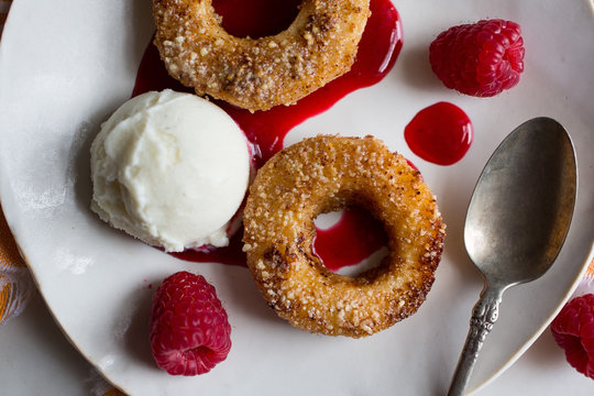 Peach doughnuts on plate