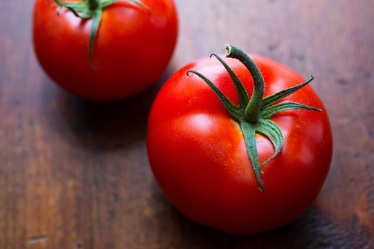Two red tomatoes