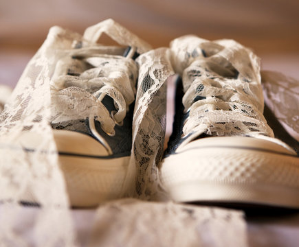 Close up of sneakers with lace shoe laces