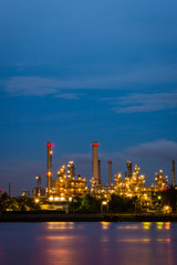 Oil refinery at twilight , Chao Phraya river, Thailand