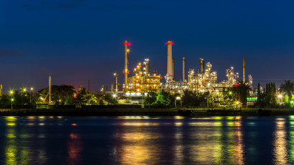 Obraz na płótnie Canvas Oil refinery at twilight , Chao Phraya river, Thailand