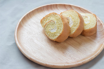 jam roll on wooden plates