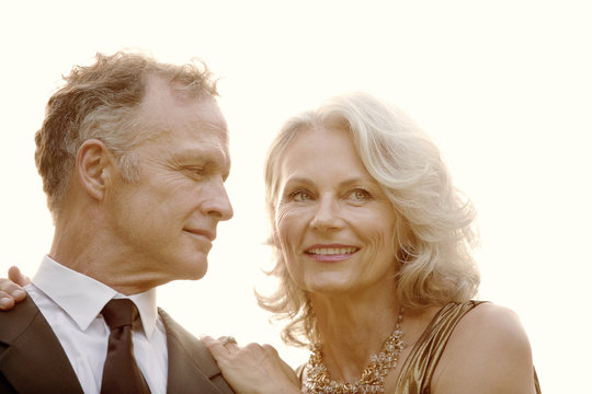 Portrait of mature couple in formal clothing