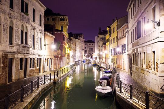 View of canal at night