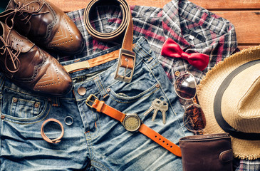 Accessories and apparel for men on a wooden floor - life style